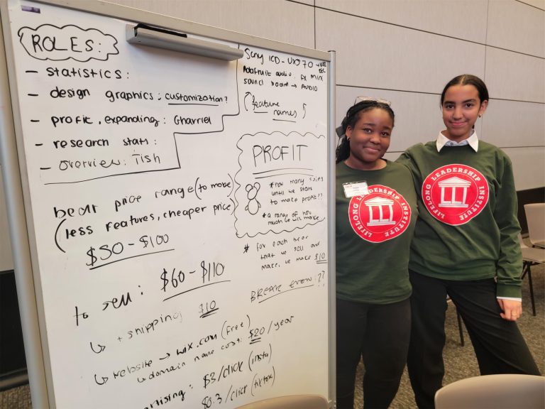 LBD students at business whiteboard